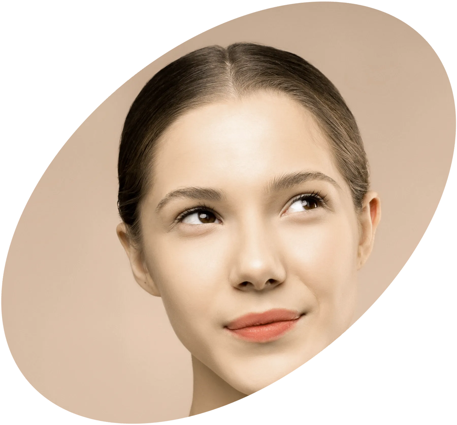 A serene woman in warm light, framed in a tilted oval